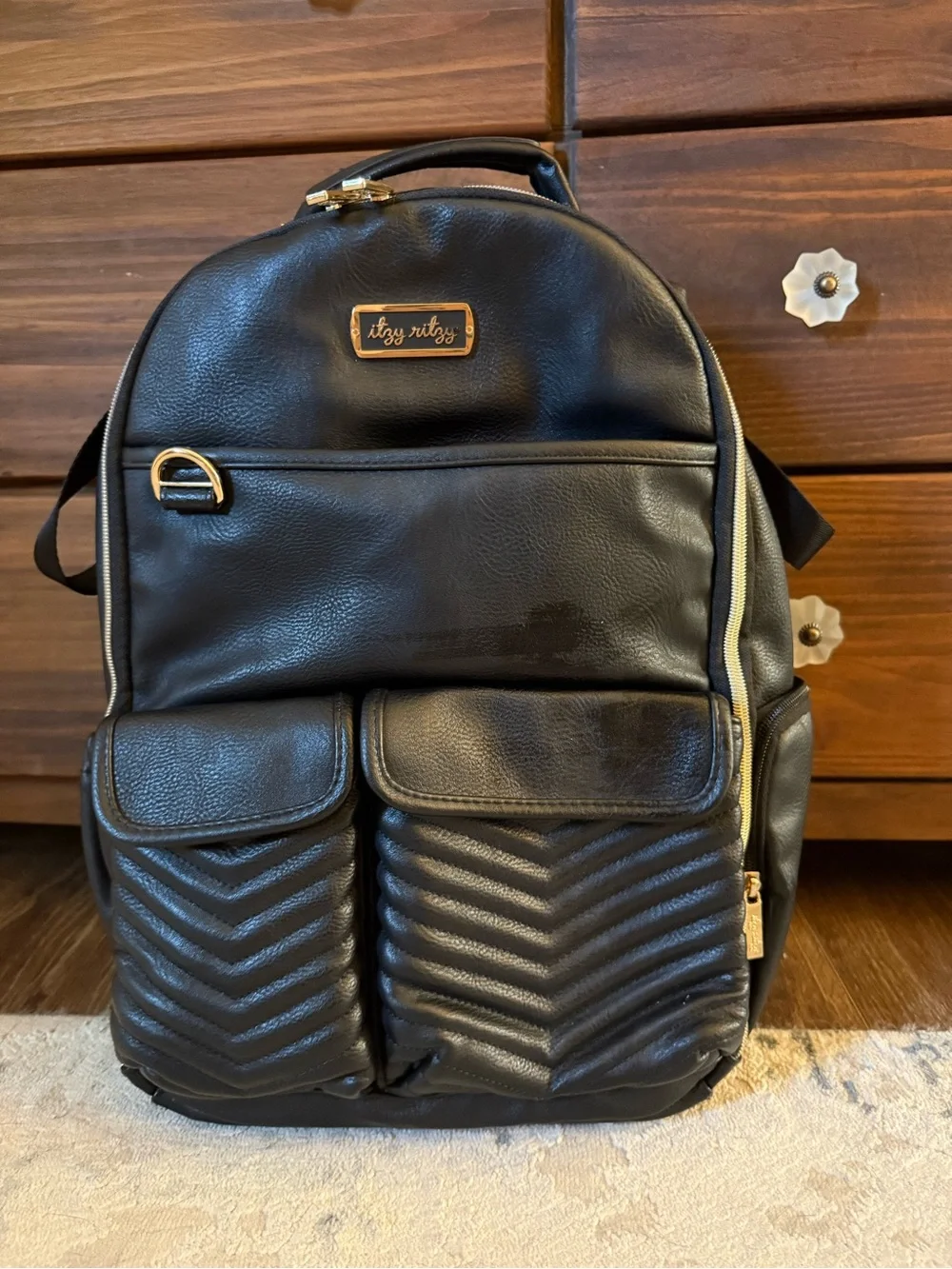 Itzy Ritzy Black Quilted Backpack with Gold Hardware